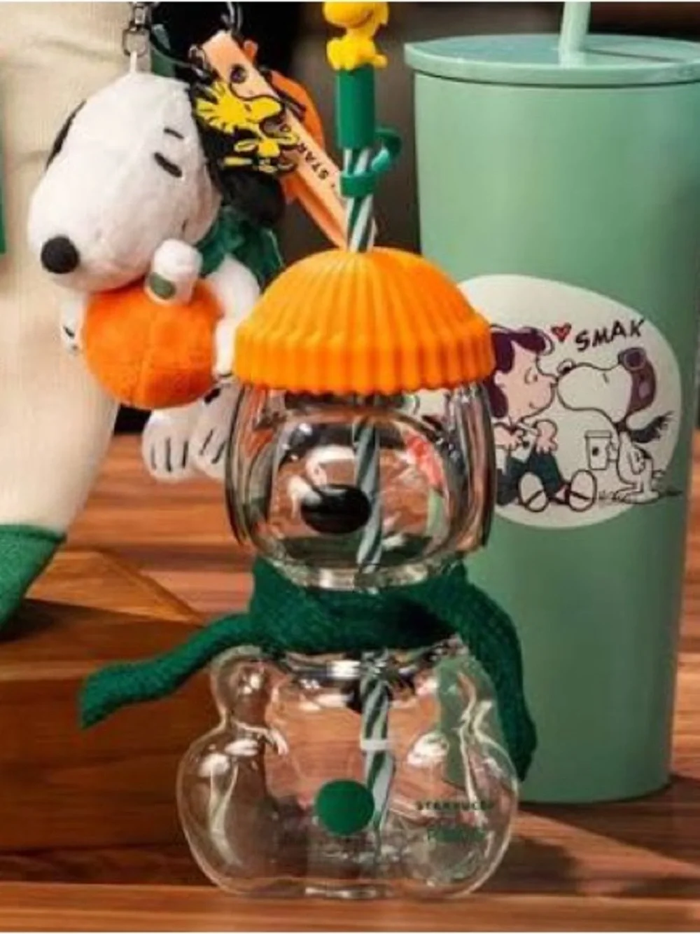 Starbucks Snoopy Clear Snowman Bottle with Orange Hat and Green Scarf